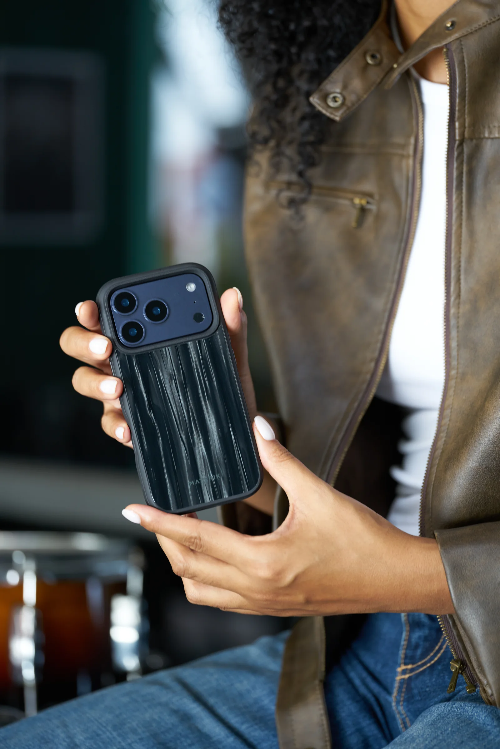 A Materik case held in the hand, archive photography
